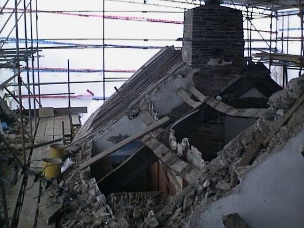 Old roof stripped and in need of repair